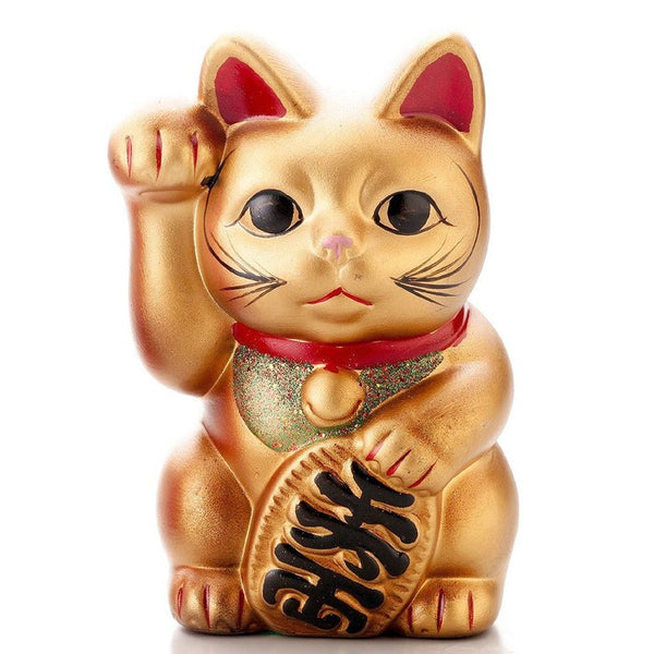 Maneki Neko golden - a cat evoking happiness and prosperity